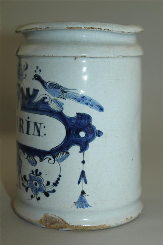 A Delft blue and white cylindrical wet drug jar, early 18th century, 15.5cm, some damage